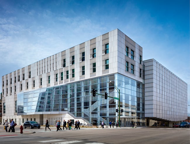 exterior of Voxman School of Music with pedestrians