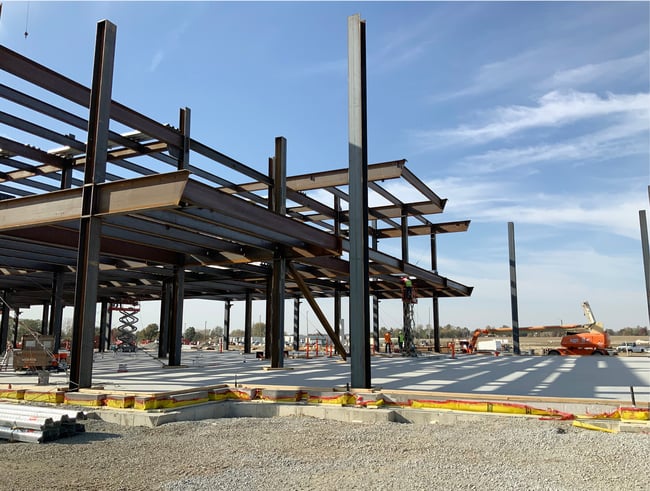 commercial building with steel structural system under construction