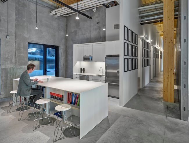 employee working in an office kitchen