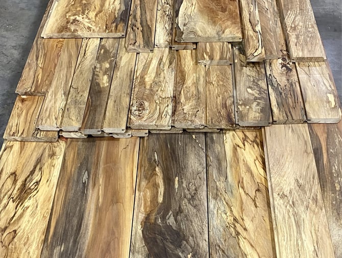 planks of sycamore wood from an urban lumber program